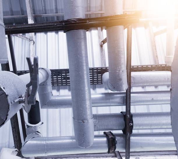 istock Installation of boiler and chiller water pipe systems in industry. 2192353590