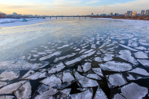 istock Han River filled with snow and ice, SeoGang Bridge 2192354602