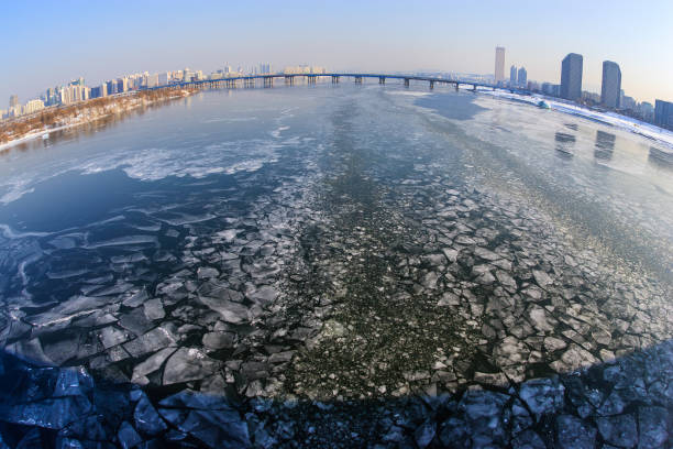 istock Han River filled with snow and ice, MaPo Bridge 2192354605
