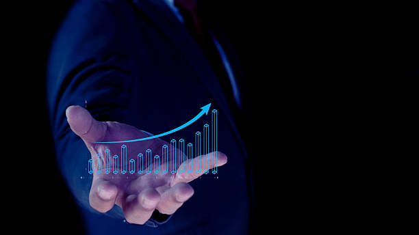 istock Businessman hand holding growing business chart. Development. Success. financial growth and marketing concept. Business growth through innovation and strategy. 2192360244