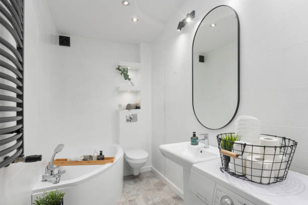 istock Modern White Bathroom with Bathtub, Sink and Toilet 2192360748