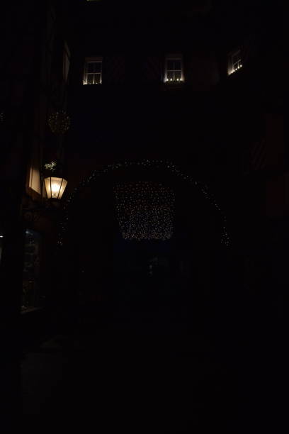 istock street lamp with Christmas lights in background 2192364566