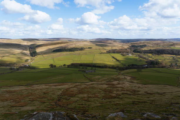 istock Expansive Countryside View with Rolling Hills and Green Fields 2192366192