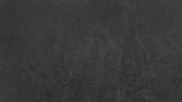 istock The image showcases a dark, almost black, marble texture with subtle variations in shade and intricate white veining, creating a luxurious. 2192367341