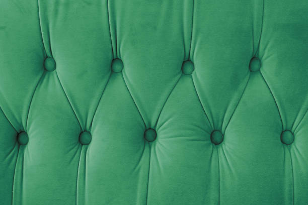 istock Capitone, Chesterfield style suede fabric texture, green diamond buttoned green background 2192367478