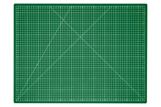 istock A big green cutting mat with a white grid is isolated. 2192370141