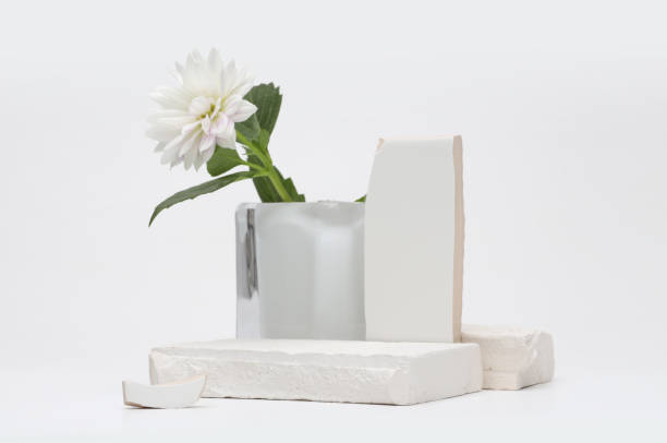 istock Stack stones platform podium and flower on gray light copy spase background. Minimal empty display product presentation scene. 2192370923
