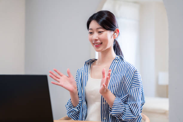 istock Young female employee participating in remote meetings from home 2192371677