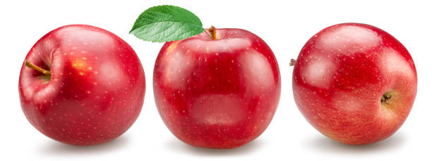 istock Three perfect red apples with green leaves on white background. File contains clipping path. 2192371931
