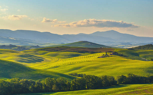 istock Rolling Green Hills In Tuscany Under Soft Sunlight Representing Tranquility And Natural Beauty 2192372106