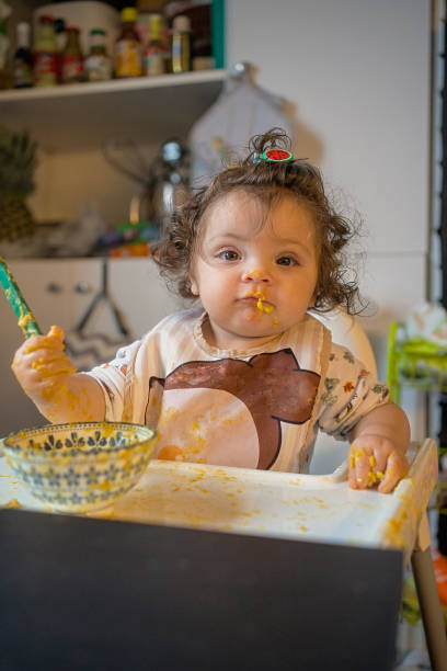 istock Playful Baby at Meal Time 2192372246