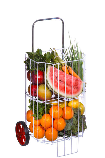 shopping cart, buying and eating vegetables, white background cut out in Path