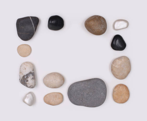 istock Stones on neutral gray copy space background. Flat lay, top view. 2192377967