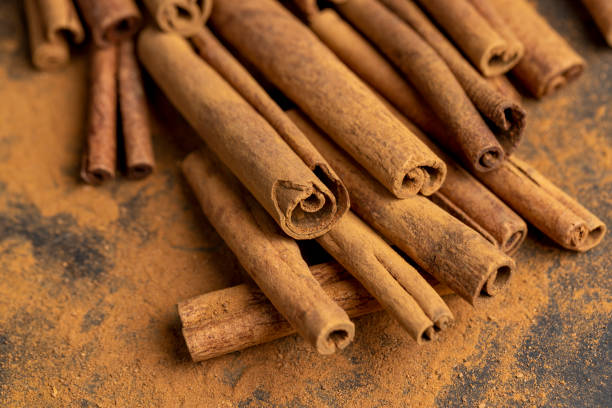 istock whole spice cinnamon and powdered cinnamon on the table 2192381763