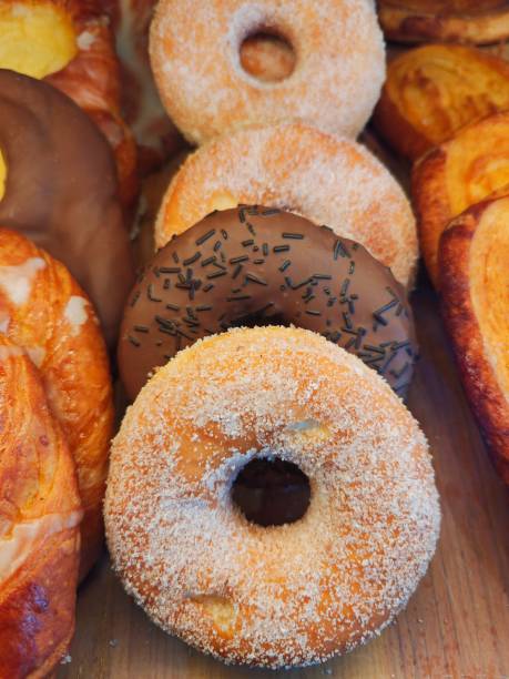 istock Donuts of different flavors for breakfast. 2192384333