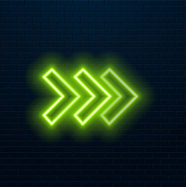 istock Neon arrow icon. Glowing neon motion sign, outline arrow pointer silhouette in vivid colors. Arrowhead and cursor navigation, movement direction, motion way. Vector icon set, sign, symbol for UI 2192386058