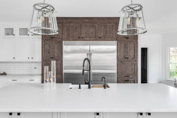 istock A kitchen detail with white and wood cabinets. 2192388189