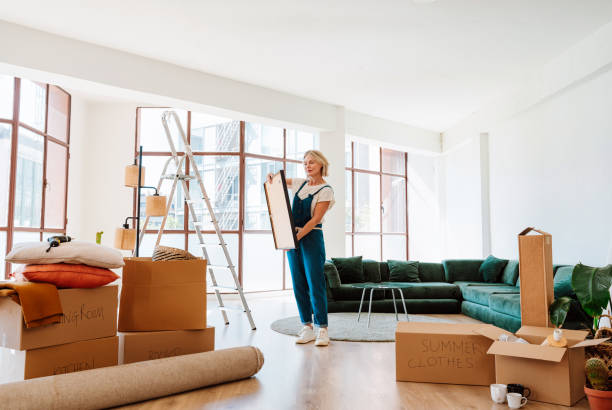 istock Single woman relocating in a new apartment 2192391877