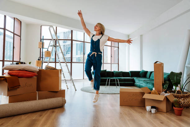 istock Single woman relocating in a new apartment 2192392019