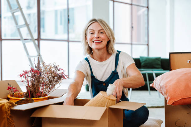 istock Single woman relocating in a new apartment 2192392033