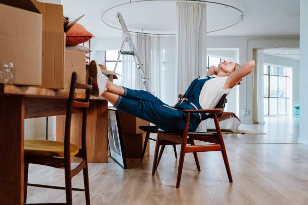 istock Single woman relocating in a new apartment 2192392444