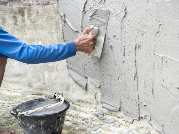 istock Worker was Plastering The Wall of The Well 2192392545