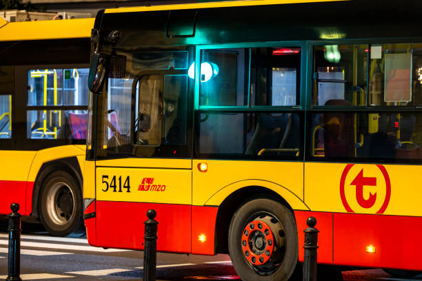 Warsaw, Poland - December 26, 2024: Public transport buses on a city street.