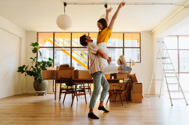istock Happy young couple relocating in a new apartment. 2192395667