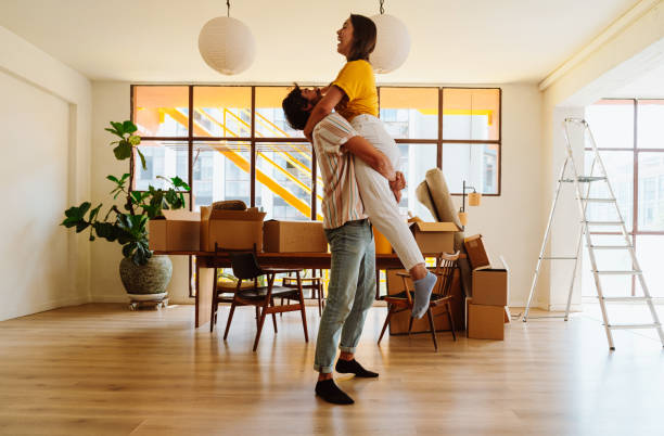 istock Happy young couple relocating in a new apartment. 2192395841
