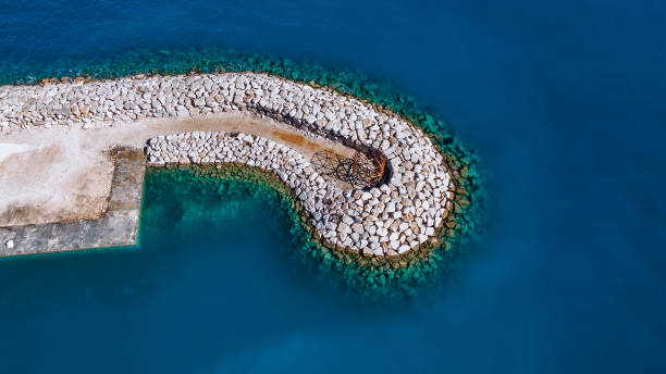 istock Unfinished Harbor Construction: Aerial View of an Abandoned Coastal Project 2192398395