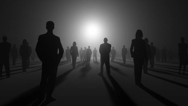 istock group of black silhouettes on black background 2192403595