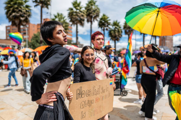 istock Non-binary gender person with friends on aLGBTQIA pride event 2192406751
