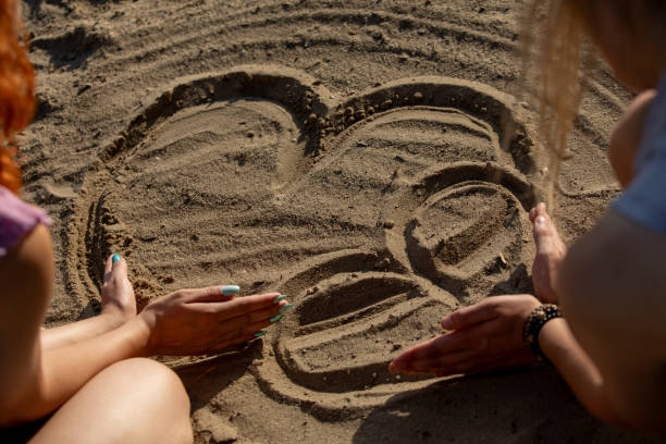 istock Experience Fun in the Sand Engaging and Creative Drawing on the Beautiful Beach 2192409129