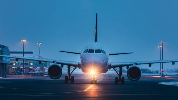 istock Front view of passenger airplane at airport 2192410742