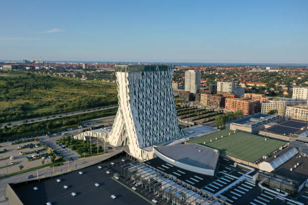 The AC Hotel Bella Sky Copenhagen, formerly the Bella Sky Comwell Hotel, is a 4-star conference hotel adjacent to the Bella Convention and Congress Center in the Ørestad district of Copenhagen, Denmark. The image shows the hotel with several other buildings in Ørestad.