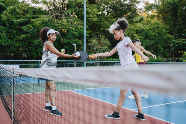 istock kids learning to play pickleball 2192419240