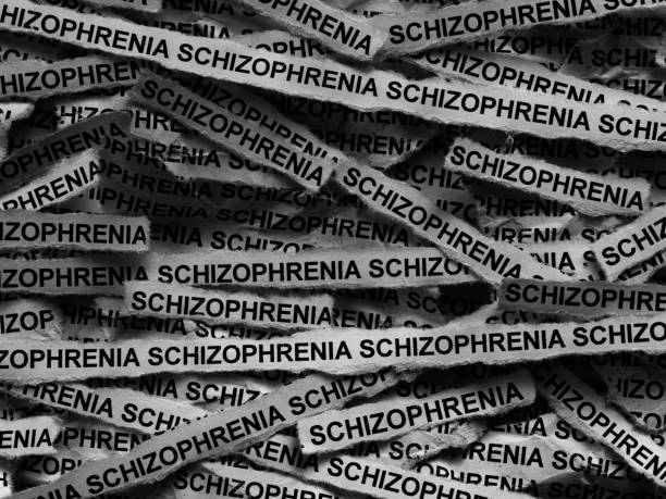 istock Strips of newspaper with the words Schizophrenia typed on them 2192420370