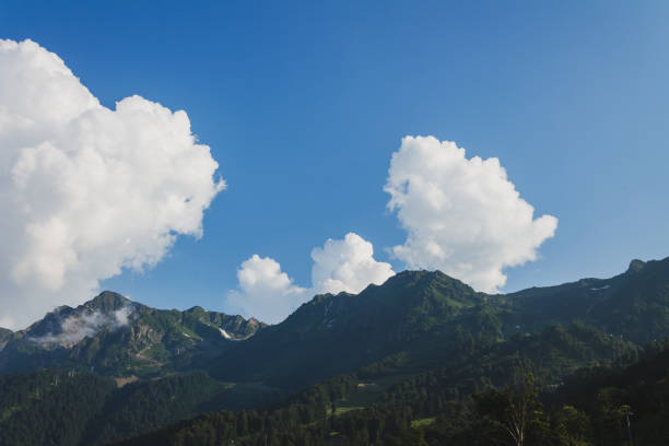 istock Majestic mountain peaks capped with snow and washed by clouds create a breathtaking wilderness landscape 2192420614