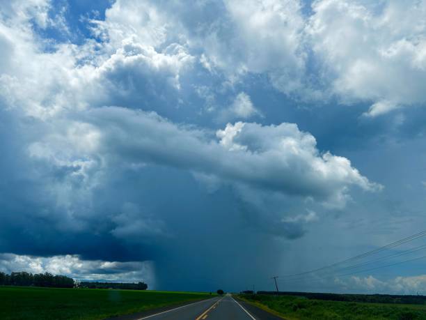 istock Beautifull rain cloud on the horizon highway. Rainy cloud wonderfull 2192422573