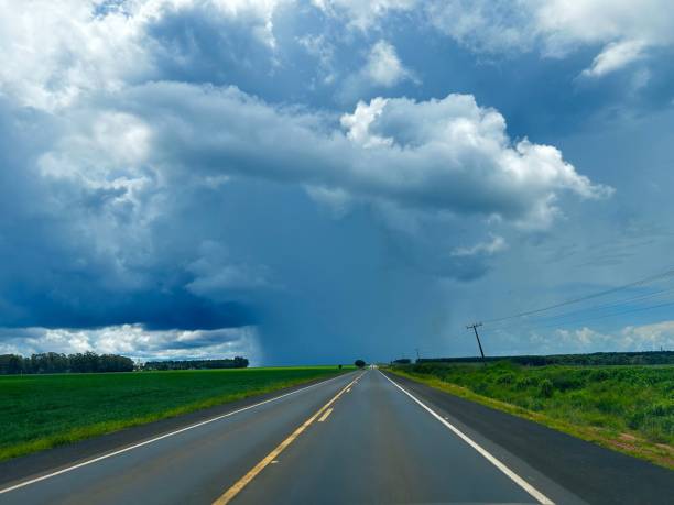 istock Beautifull rain cloud on the horizon highway. Rainy cloud wonderfull 2192422575