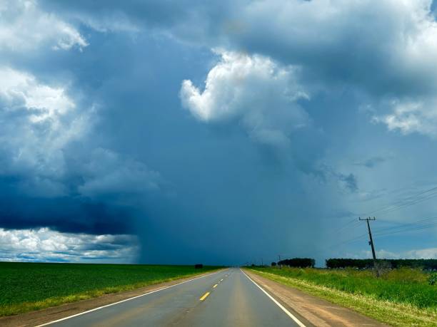 istock Beautifull rain cloud on the horizon highway. Rainy cloud wonderfull 2192422593