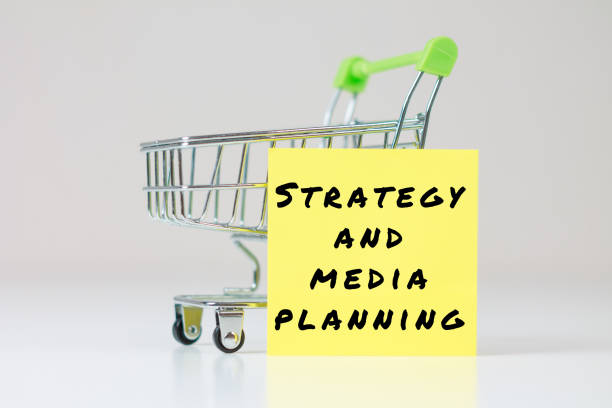istock Strategy and media planning inscription on a colored sticker 2192423714