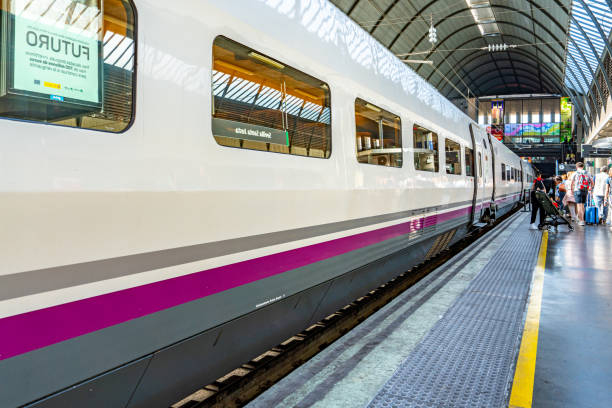 Seville Santa Justa Train Station, Spain The train parked at the platform is waiting for tourists boarding. Seville Santa Justa Train Station view, Spain. santa justa lift portugal stock pictures, royalty-free photos & images