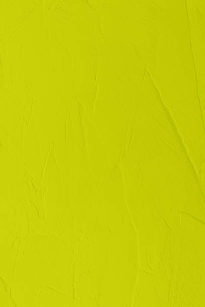 istock pastel greenish yellow low contrast Concrete textured background 2192424871