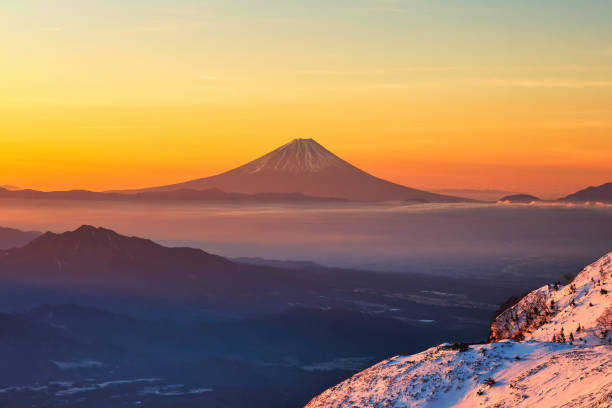 Snow-capped Mount Fuji at sunrise in Japan