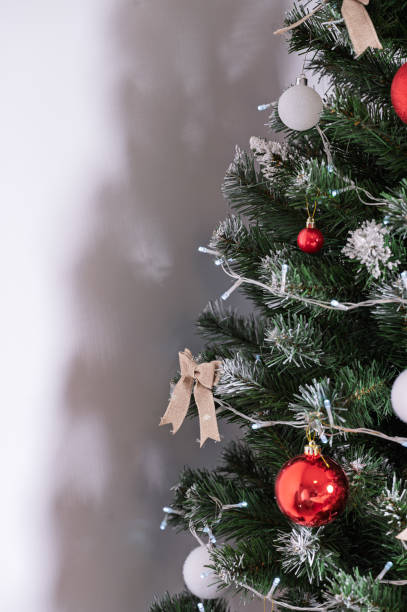 istock Christmas tree with balls on a white background 2192434364