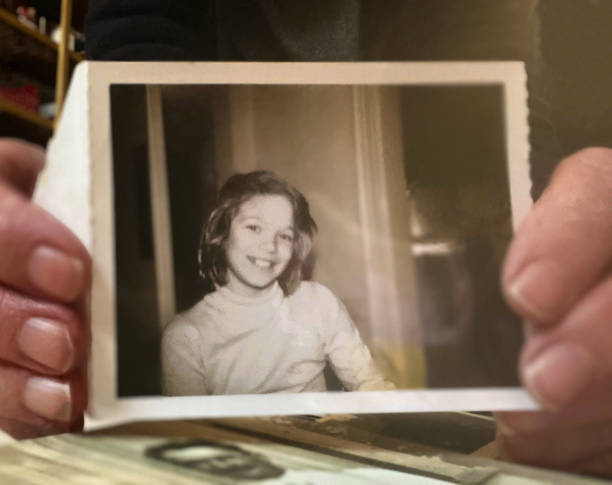 istock Holding an Old Photo 2192434371