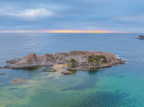 istock Cloud-covered sunrise over Guerilla Bay 2192434391