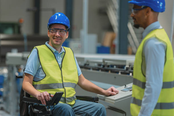 istock Engineer team, African American man and one with disability 2192435150