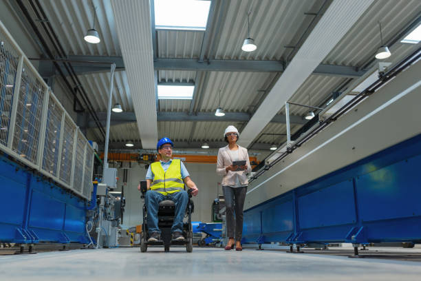 istock Female manager training a new employee with a disability for a job 2192435430